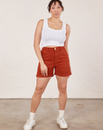 Tiara is 5’4” and wearing S Classic Work Shorts in Paprika paired with Cropped Tank Top in vintage tee off-white