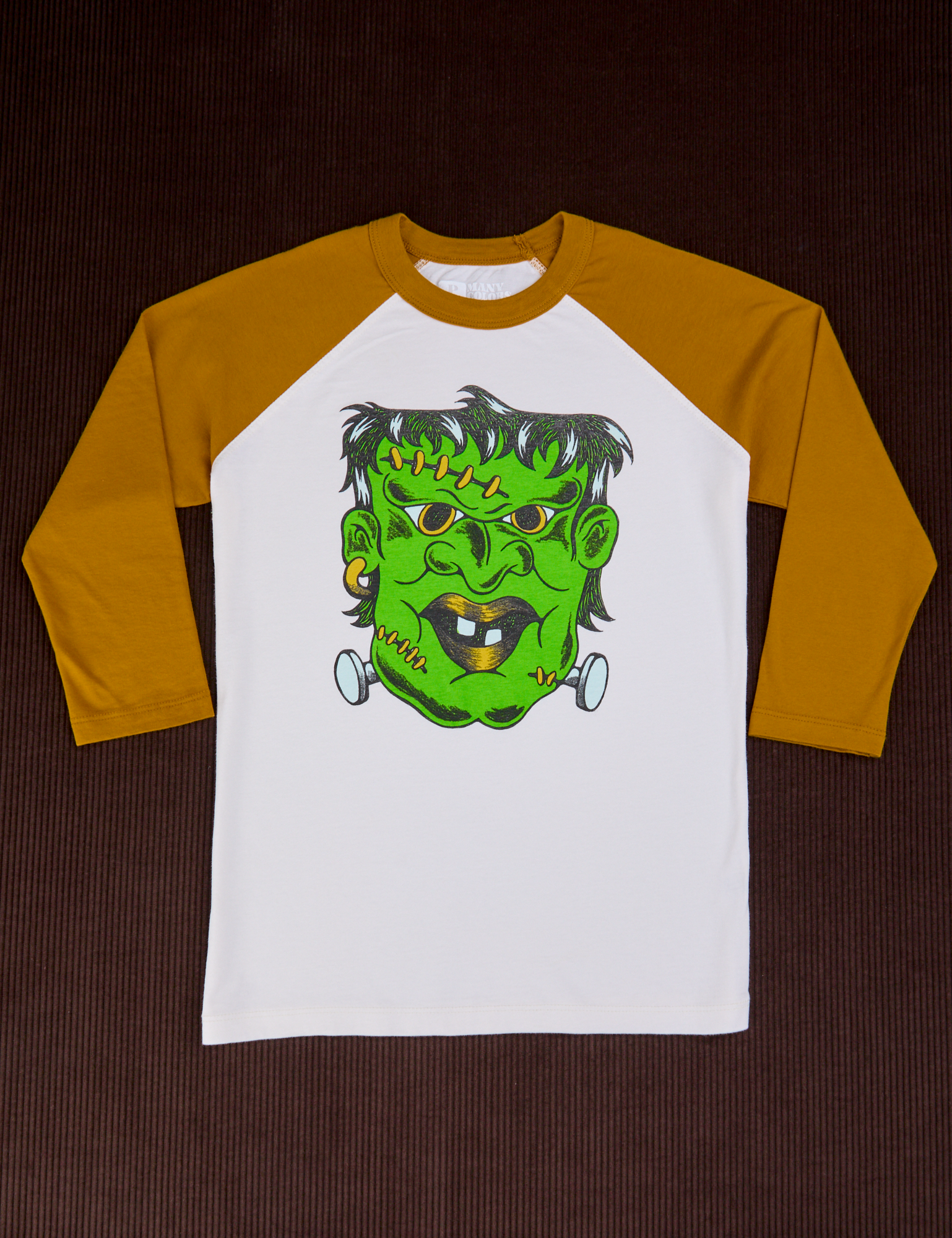 Raglan Tee in Frankenstein. White tee body with spicy mustard 3/4 sleeves
