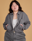 Ashley is 5’7” and wearing L Heritage Mechanic Jacket in Washed Grey