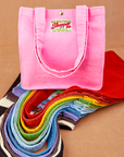 Shopper Tote Bag in a rainbow of hues. Bubblegum pink colorway on top of stack of all other colors.