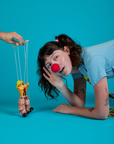 Short Sleeve Jumpsuit in Baby Blue on Alex with a red clown nose