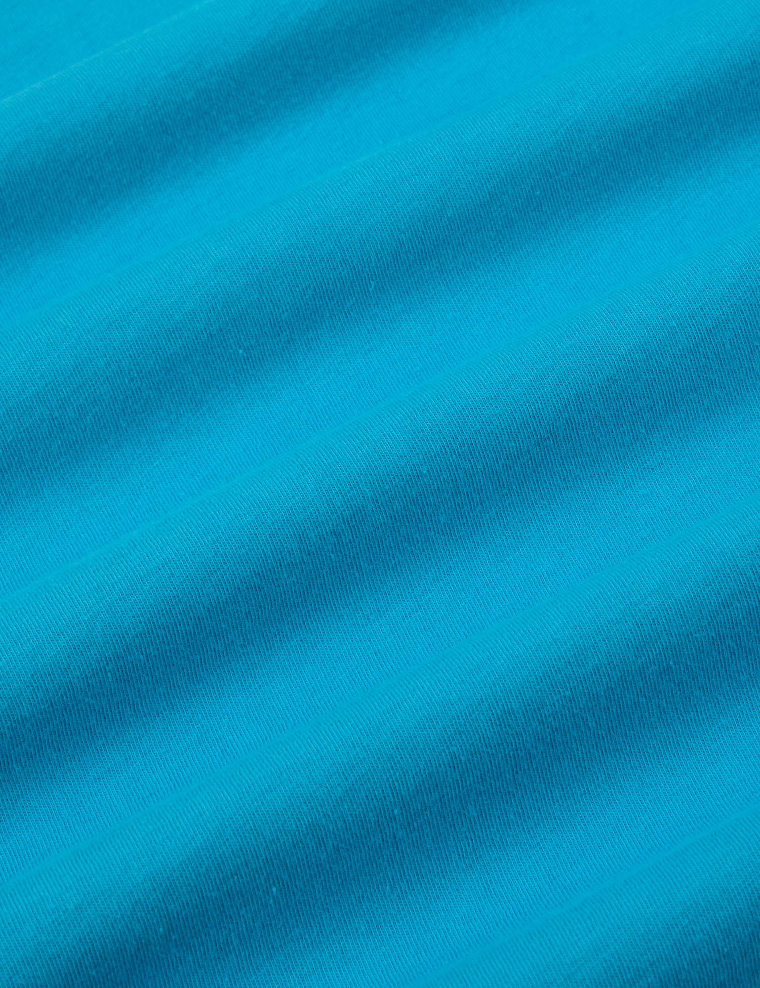Mismatched Tee in Blue & Green fabric detail close up