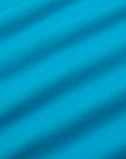 Mismatched Tee in Blue & Green fabric detail close up