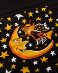 Close up of the yellow and white stars, yellow and orange moon and witch