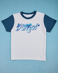 White body with blue sleeves and neckline. Angel text in baby blue and darker blue shadow in center of shirt. Butterfly and hearts surround text.