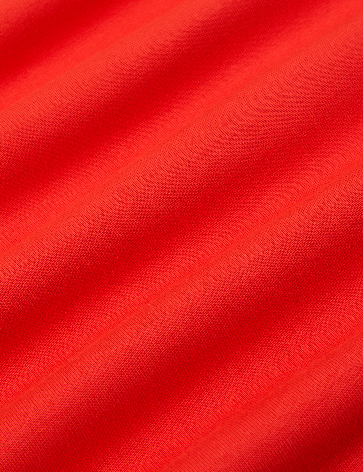Baby Tee in Mustang Red fabric detail close up
