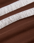 Painted Muscle Tee in Fudgesicle Brown fabric close up detail with white painted stripes