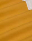 Painted Work Pants in Mustard Yellow fabric detail close up