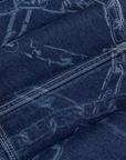 Mid-Rise Carpenter Jeans in Chain Link fabric detail close up
