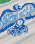 Made in LA Benefit Tee close up of blue dove