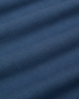 Baggy Mid-Rise Trousers in French Blue fabric detail close up
