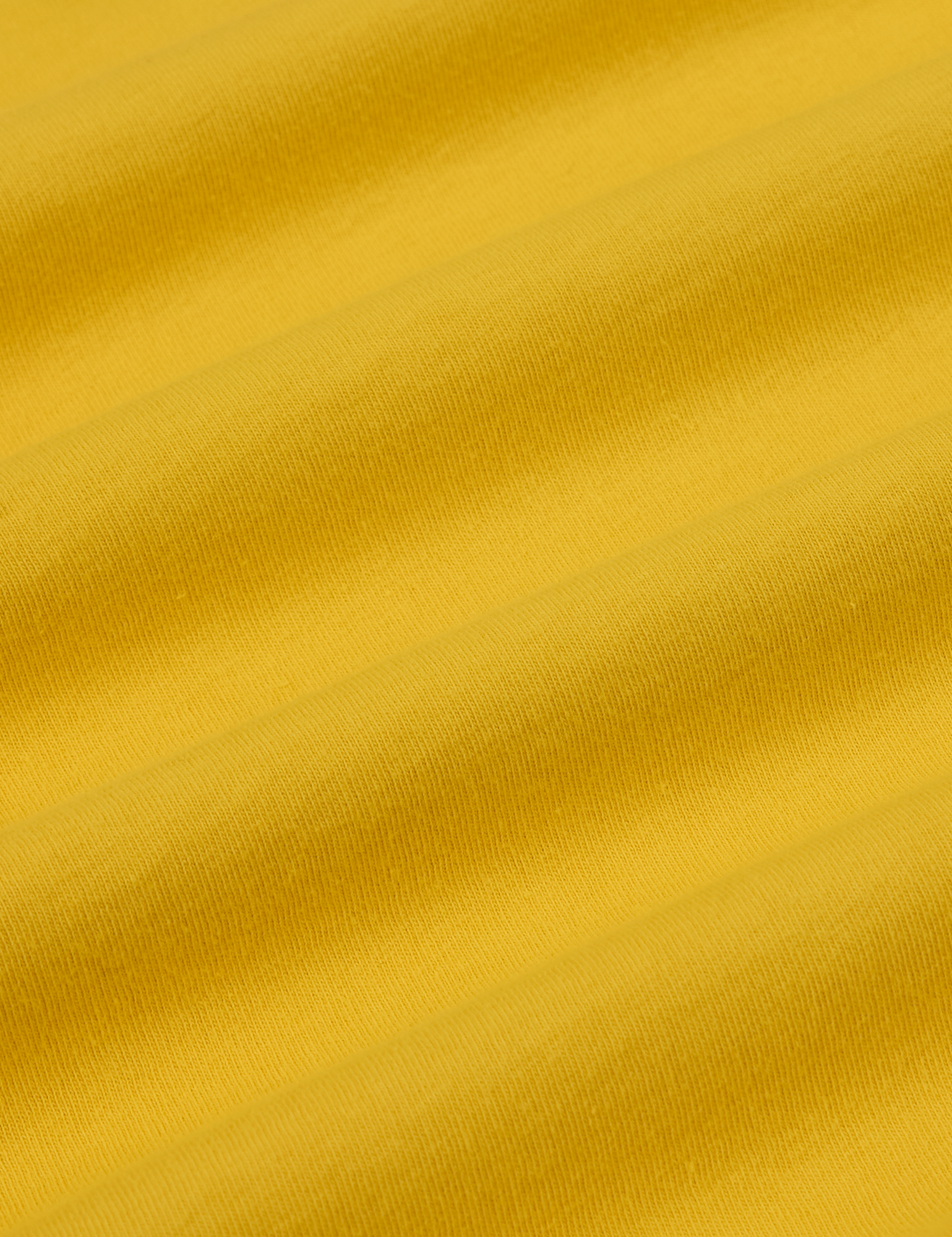 Mismatched Tee in Yellow & Red fabric detail close up