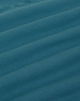 Essential Turtleneck in Marine Blue fabric detail close up