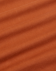 Oversize Overshirt in Burnt Terracotta fabric detail close up