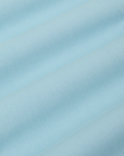 Short Sleeve Jumpsuit in Baby Blue fabric detail close up