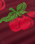 Paintstamped Work Pants in Cherry close up of red cherries with green leaves