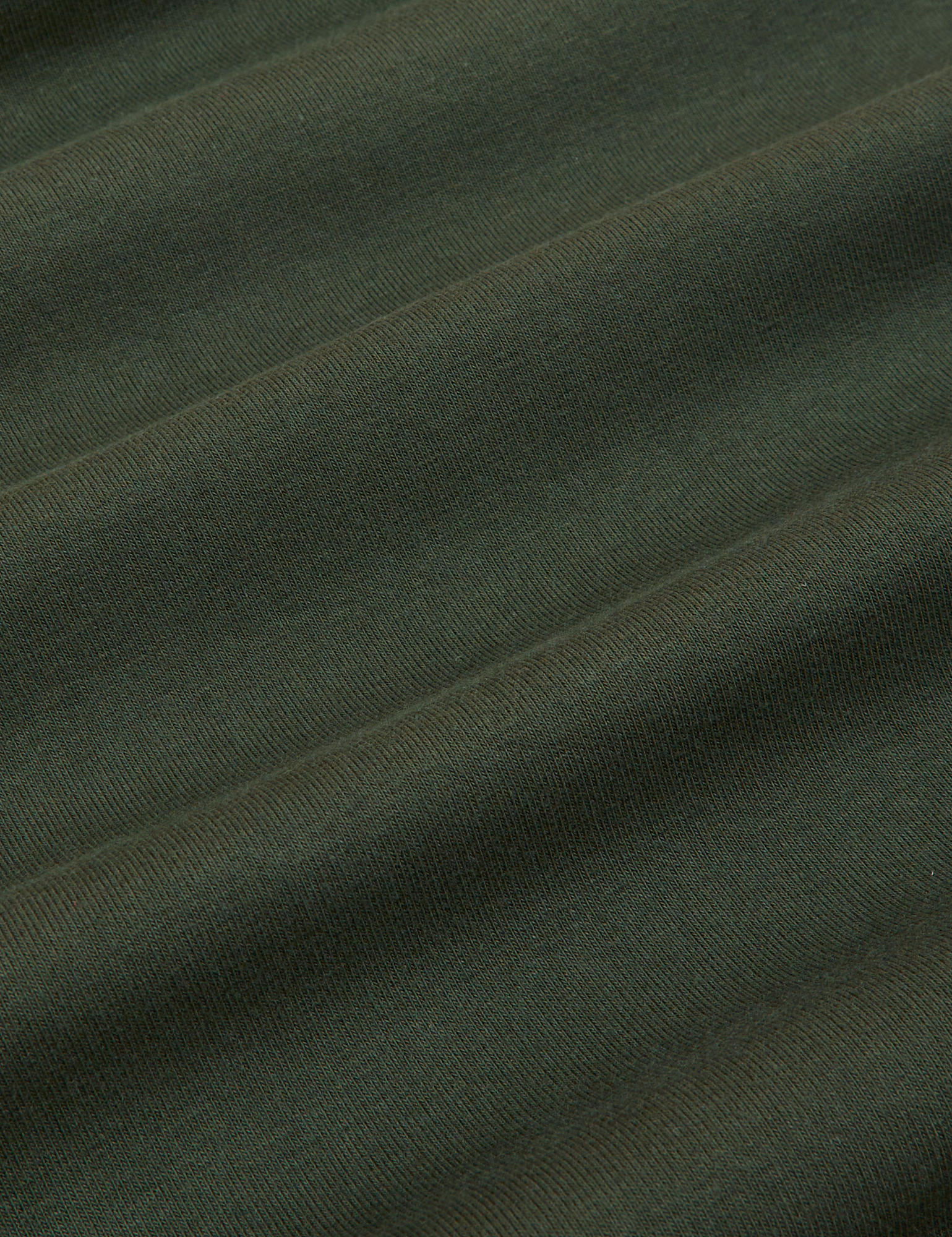 The Tank Top in Swamp Green fabric detail close up