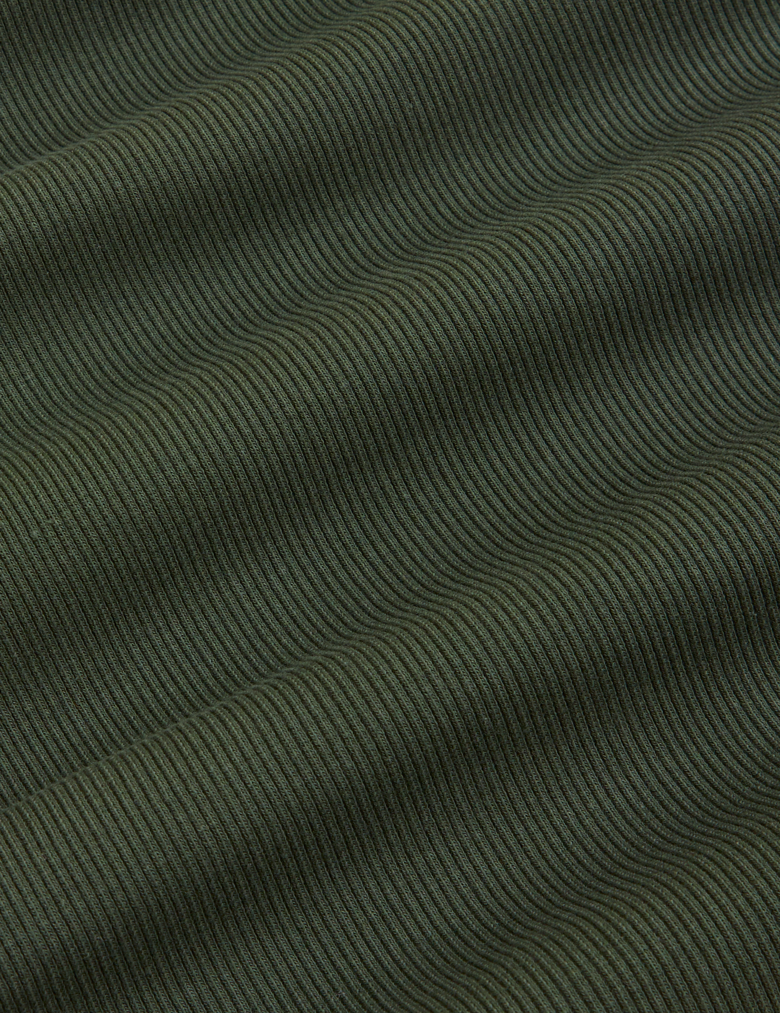 Sleeveless Essential Turtleneck in Swamp Green fabric detail close up