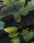 Magic Waters Drop Pocket Pants in Green Pool fabric detail close up. Tie dye in shades of green, turquoise and black