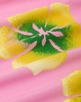 Paintstamped Pantry Button-Up in Bubblegum Pink fabric detail close up. Yellow and green paintstamped flowers.