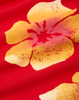 Paintstamped Pantry Button-Up in Mustang Red fabric detail close up. Yellow and red paintstamped flowers.
