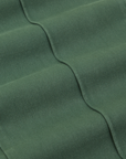 Western Pants in Dark Green Emerald fabric detail close up
