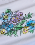 Floral Long Sleeve Baby Tee in Baby Blue close up of screen-printed flowers