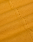Denim Work Jacket in Mustard Yellow fabric detail close up