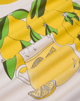 Anniversary Tee in Lemon close up of lemons and lemonade