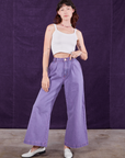 Alex is 5'8" and wearing XXS Overdyed Wide Leg Trousers in Faded Grape paired with vintage off-white Cami