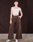 Alex is 5'8" and wearing XXS Overdyed Wide Leg Trousers in Brown paired with Cropped Cami in vintage tee off-white