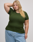 Juliet is wearing Baby Tee in Evergreen