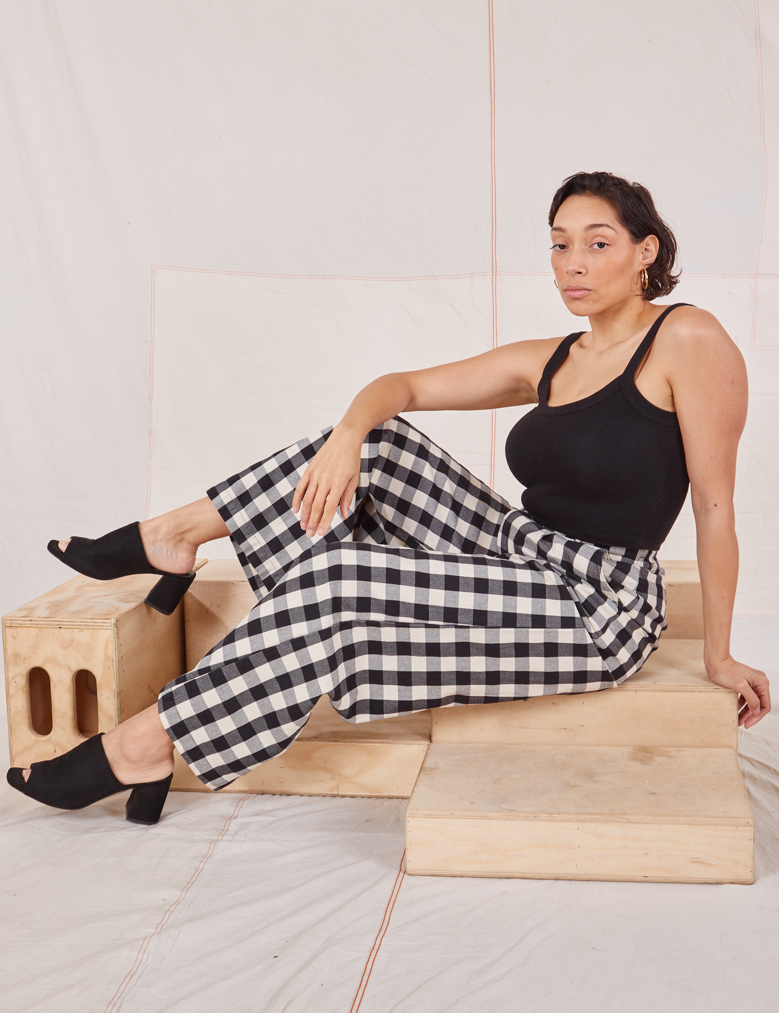 Tiara is wearing Wide Leg Trousers in Big Gingham and black Cropped Cami
