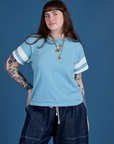 Sydney is 5’9” and wearing XXS Painted Burly Tee in Baby Blue