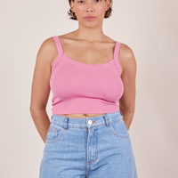 Tiara is wearing Cropped Cami in Bubblegum Pink and light wash Sailor Jeans