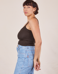 Side view of Cropped Cami in Espresso Brown and light wash Sailor Jeans worn by Tiara