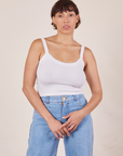 Tiara is wearing Cropped Cami in Vintage Tee Off-White and light wash Sailor Jeans