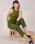 Alex is wearing Railroad Carpenter Jeans in Summer Olive and Muscle Tee in Summer Olive