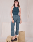 Alex is 5’8” and wearing XXS Railroad Carpenter Jeans in Baby Blue paired with marine blue Muscle Tee
