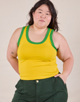 Ashley is 5'7" and wearing L Colorblock Cropped Tank in Golden Yellow