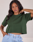 Kandia is 5'3" and wearing P Cropped Burly Tee in Swamp Green