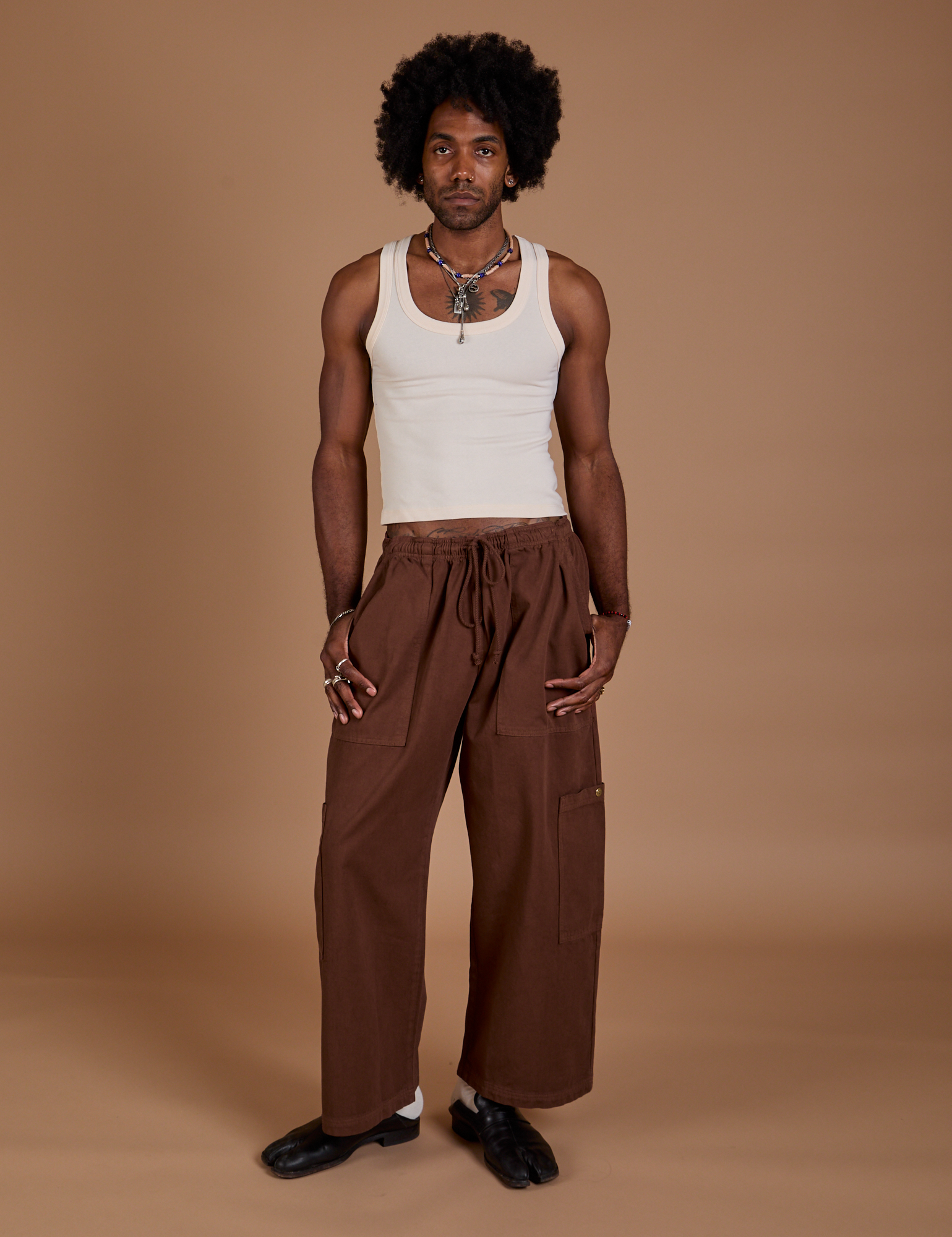 Drop Pocket Cargo Pants in Fudgesicle Brown and Tank Top in vintage tee white on Jerrod