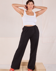 Tiara is 5'4" and wearing S Easy Western Pants in Basic Black