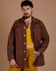 Jesse is 5'8" and wearing XS Ripstop Field Coat in Fudgesicle Brown