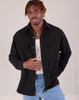 Isaac is 5'10" and wearing S Flannel Overshirt in Basic Black