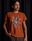 Anthony is 5'6" and wearing S Vintage Tee in Spidey
