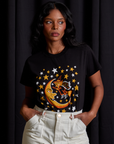Kandia is 5'3" and wearing XXS Vintage Tee in Moon & Witch