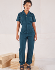 Mika is 5’1” and wearing XXS Heritage Short Sleeve Jumpsuit in Lagoon