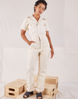 Mika is 5’1” and wearing XXS Heritage Short Sleeve Jumpsuit in Natural