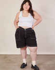 Ashley is wearing Carpenter Shorts in Basic Black and Cropped Tank in vintage tee off-white